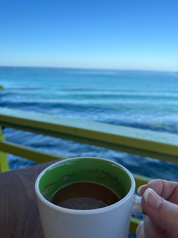 A nice cup of coffee while watching the waves on Maho Beach