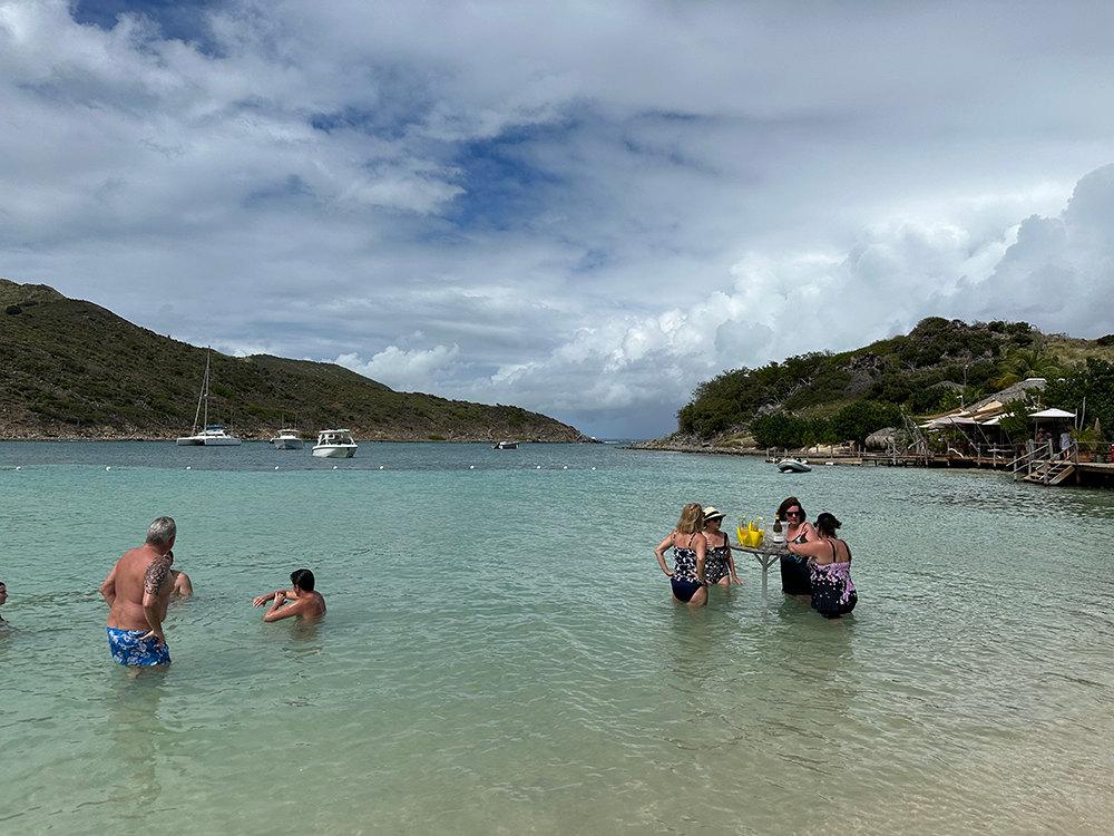 Bar tables anchored in the water