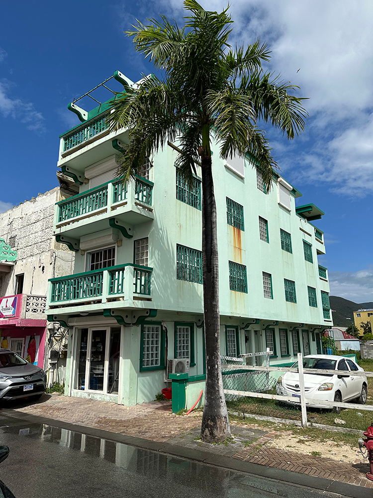 Colorful architecture in Philipsburg - green hotel